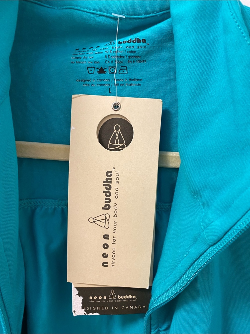 neon buddha turquoise zip-up jacket